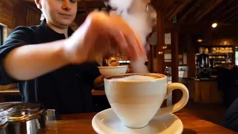 AI Video from prompt: A coffee shop in Lviv. A barista prepares coffee