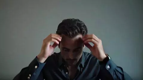 AI Video from prompt: Video showing man dealing with the voices in his