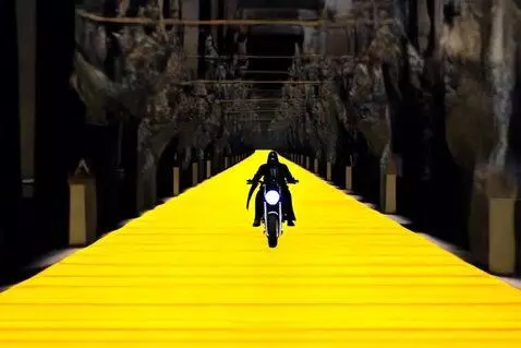AI Video from prompt: darth vader riding a motorcycle down the yellow 