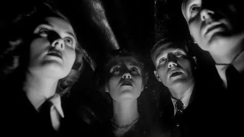 AI Video from prompt: Close-up of séance participants frozen in awe an
