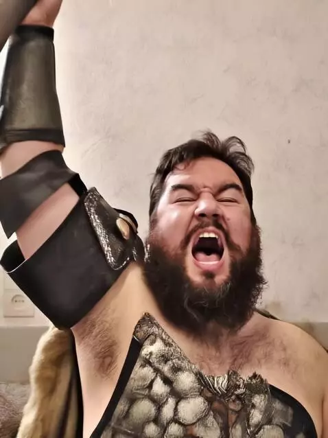 AI Video from prompt: viking with face paint and in full war costume h