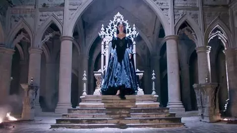 AI Video from prompt: A powerful dark queen rising slowly from a thron