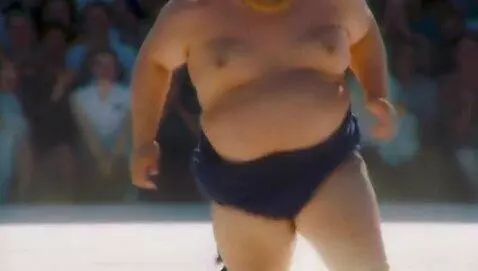 AI Video from prompt: sumo wrestler running