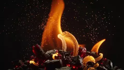 AI Video from prompt: Macro, abstract footage of burning charcoal and 