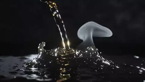 AI Video from prompt: Liquid simulation of thick, dark oil (fear) bein