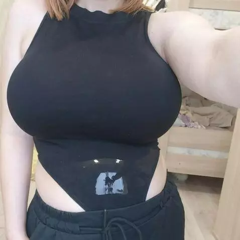 AI Video from prompt: The girl's belly fills with water and becomes la