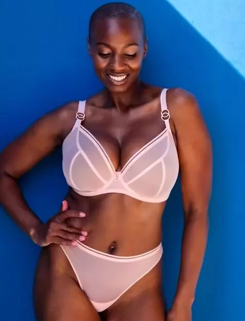 AI Video from prompt: The breasts are rhythmically swaying up and down