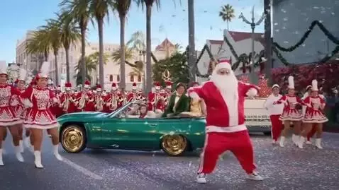 AI Video from prompt: A holiday parade in Hollywood, Califonia for Chr