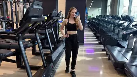 AI Video from prompt: shows off in front of the mirror, takes two step