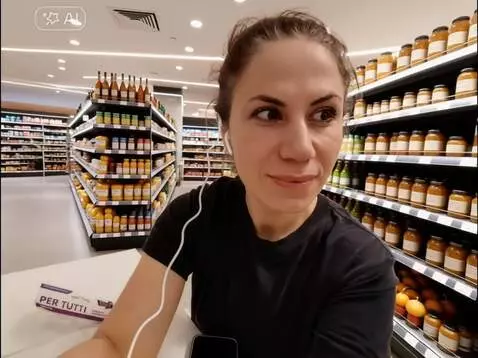 AI Video from prompt: So that she could get bread and onions in the st