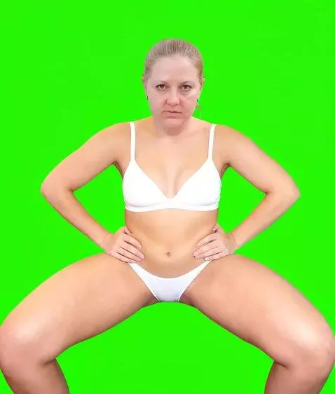 AI Video from prompt: She moves her hips left to right, her eyes are a