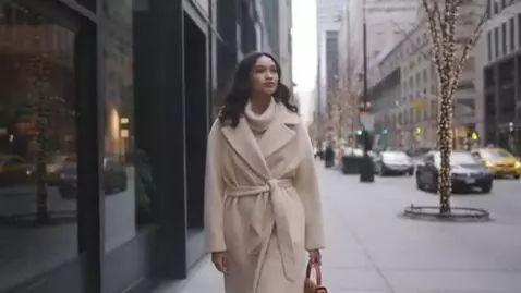 AI Video from prompt: beautiful woman walk thought city aspect ratio 9