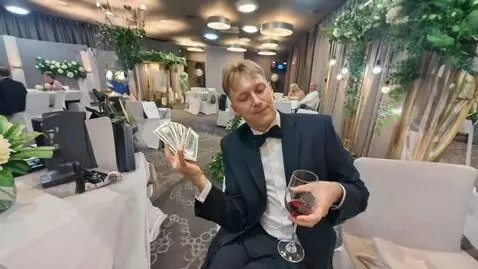 AI Video from prompt: this guy is casually waving around some bills an