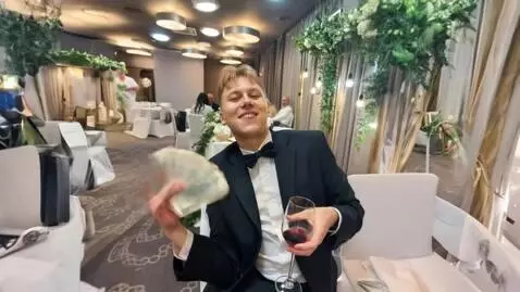 AI Video from prompt: this guy is casually waving around some bills an