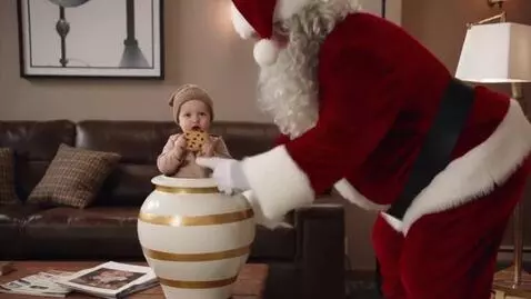 AI Video from prompt: A stern, over-the-top parody Santa Claus breaks 