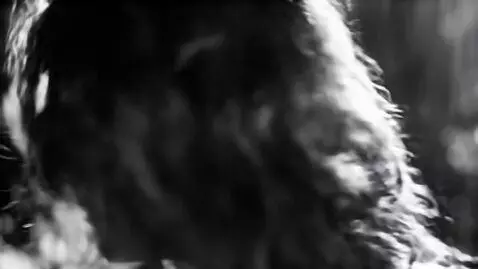 AI Video from prompt: A young, beautiful woman is sad. She turns away 