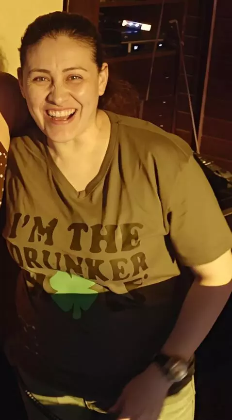 AI Video from prompt: She lifts her shirt up and shows her stomach