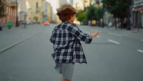 AI Video from prompt: A boy with slightly disheveled straw-colored hai