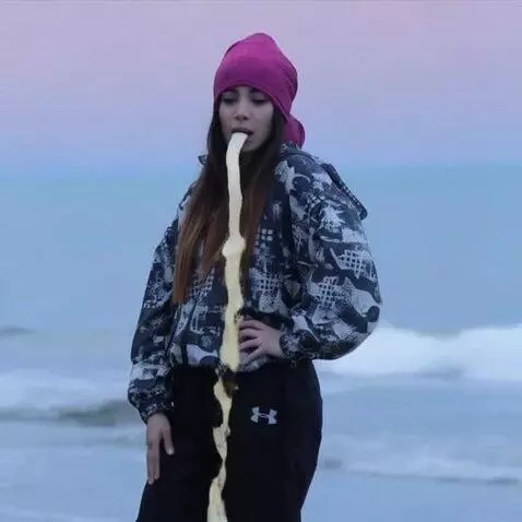 AI Video from prompt: the girl sticks out her tongue, thick saliva slo