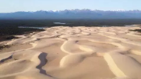 AI Video from prompt: Make a video! Panoramic video of Charsky sands f