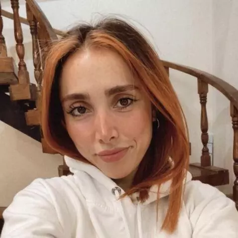 AI Video from prompt: a cute girl doing a playful and fun tiktok dance