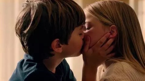 AI Video from prompt: A boy kissing a girl intensely