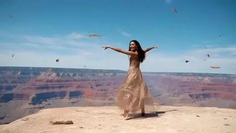 AI Video from prompt: hair long dress made gold crystal doing ballet i