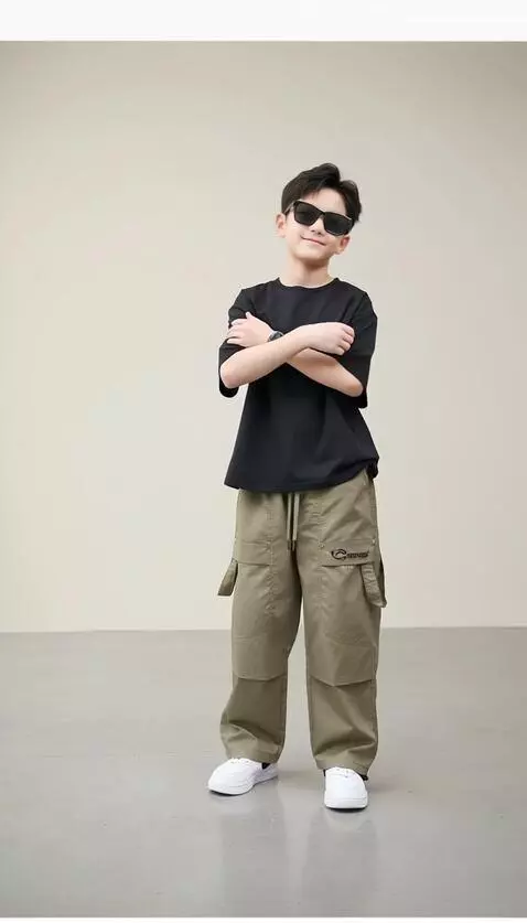 AI Video from prompt: “The boy crosses his arms with a subtle smile, c