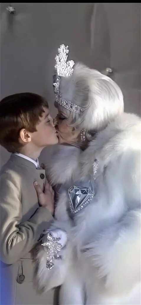 AI Video from prompt: A fifty-year-old snow queen with a diamond on he