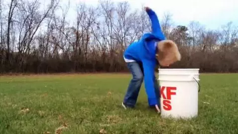 AI Video from prompt: A little white boy runs across a field and falls
