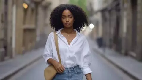 AI Video from prompt: She walks and shakes her chest