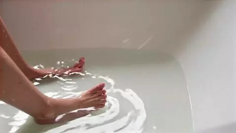 AI Video from prompt: girl  show her feet