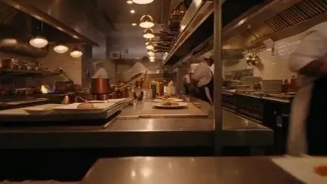 AI Video from prompt: A dynamic dolly shot moving forward through a bu