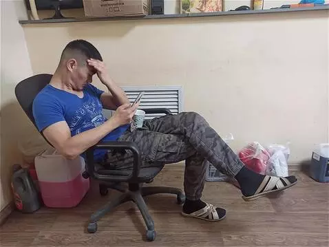 AI Video from prompt: The person in the image falls asleep sitting on 