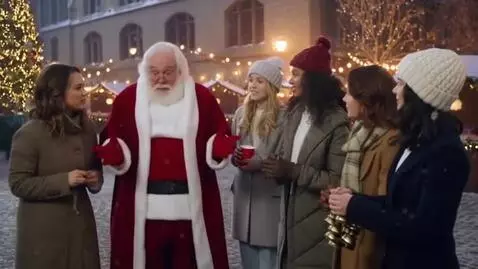 AI Video from prompt: Santa Claus has lost his hat! He asks Alexandra,