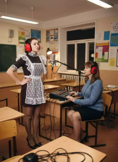 AI Video from prompt: A woman with headphones is singing.  The camera 