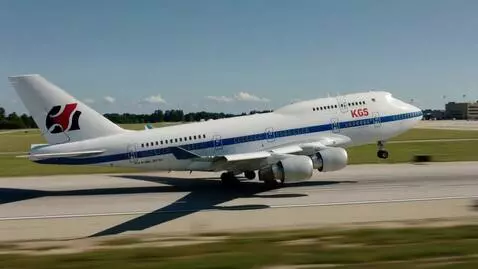 AI Video from prompt: Airplane with kardoz logo on side take off, carg