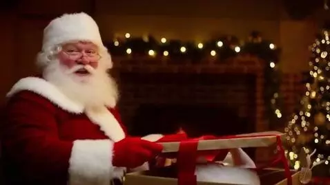 AI Video from prompt: Santa Claus opens a box and finds his hat in it.