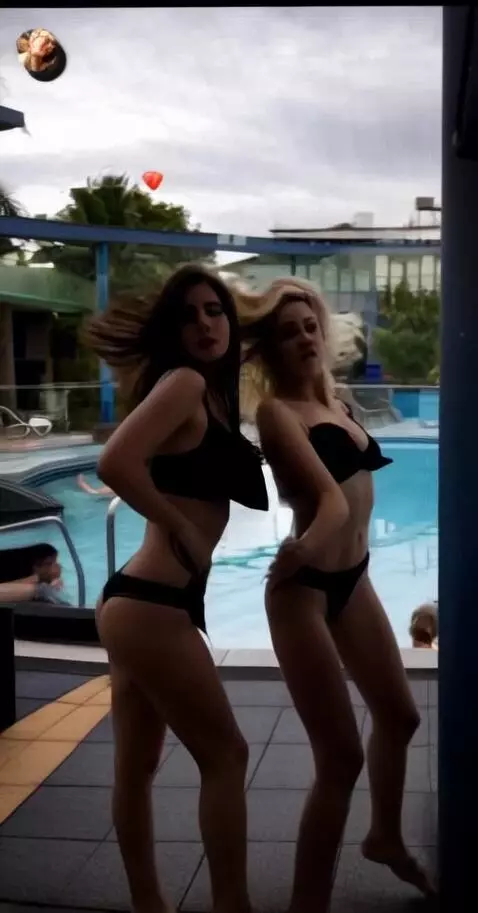 AI Video from prompt: girl dance with seductive looks