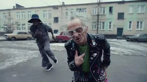 AI Video from prompt: A rapper named Zoomer is an old skinny Russian g