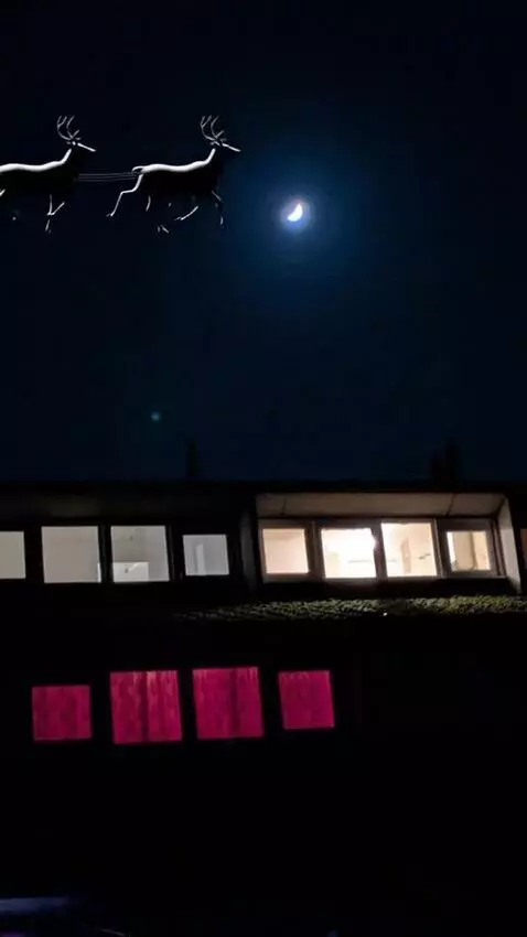 AI Video from prompt: Santa and his sleigh being drawn by reindeer fly