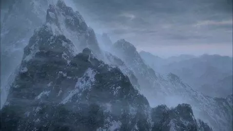 AI Video from prompt: Snowy mountains. A strong snowstorm. A gray sky.
