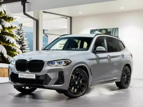 AI Video from prompt: A powerful, matte grey BMW X3 M Competition (G01