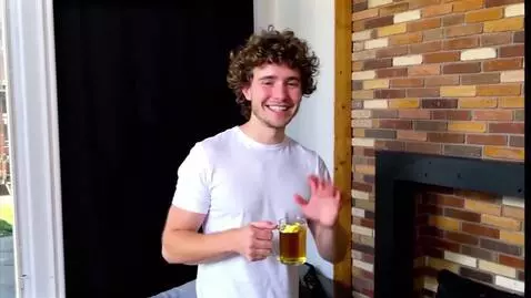 AI Video from prompt: A YOUNG MAN, WITH A GENTLE SMILE, TELLS A STORY 