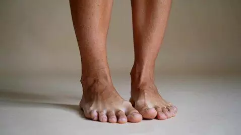 AI Video from prompt: a skinny arab woman show her big feet to the cam