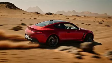 AI Video from prompt: Rossa supercar, a sleek two-door coupe with a li