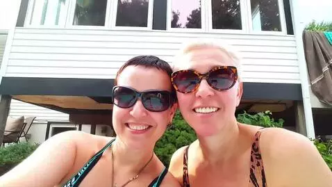 AI Video from prompt: The couple in the photo kiss passionately.