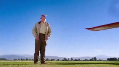 AI Video from prompt: An old man wearing a hat with propellers on his 