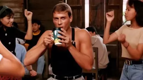 AI Video from prompt: Character dances and sips from cup of coffee in 