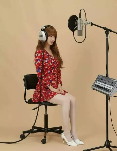 AI Video from prompt: A woman wearing headphones reads a text. The cam